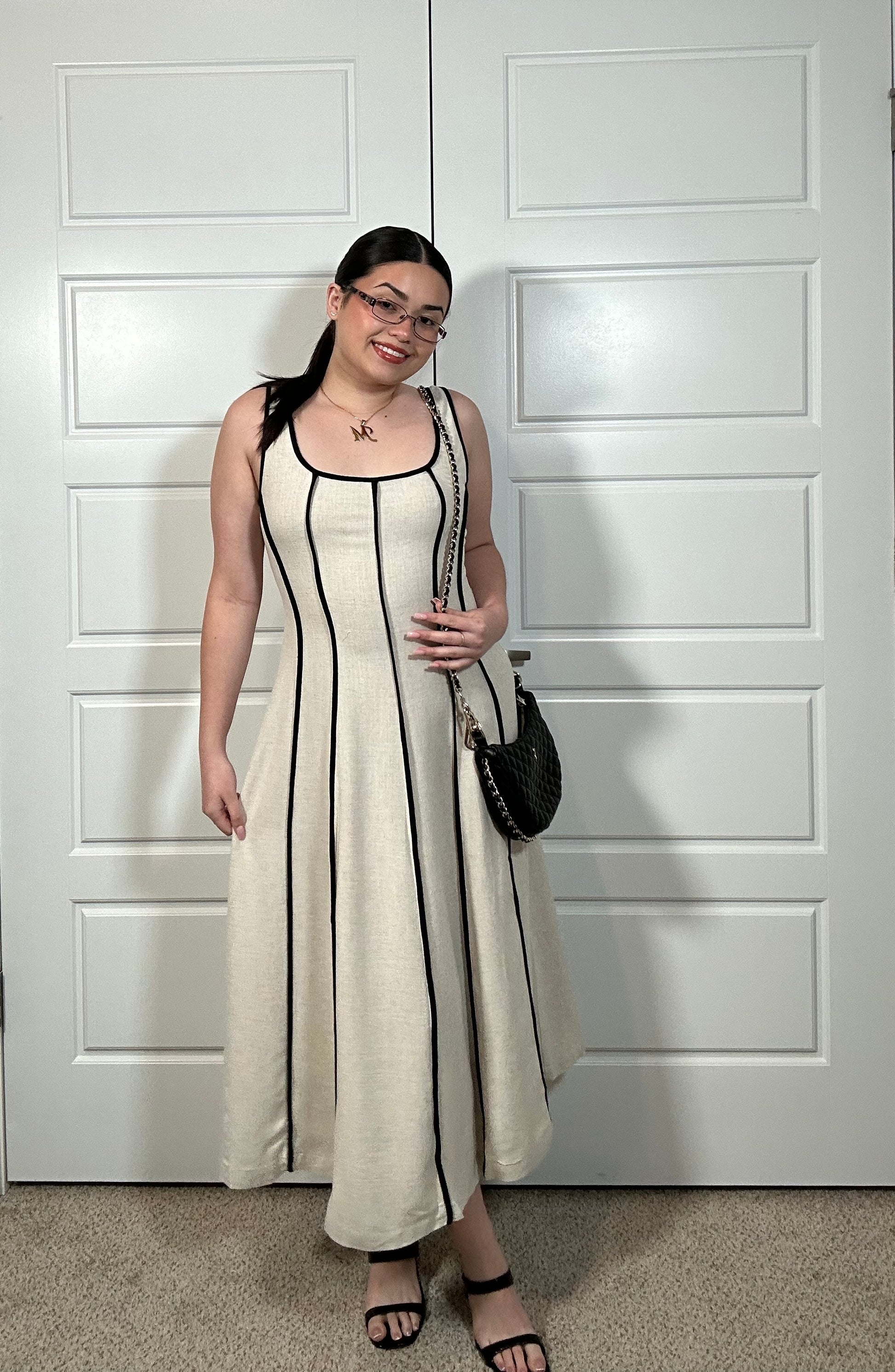 Cream colored tea length dress with black stripes