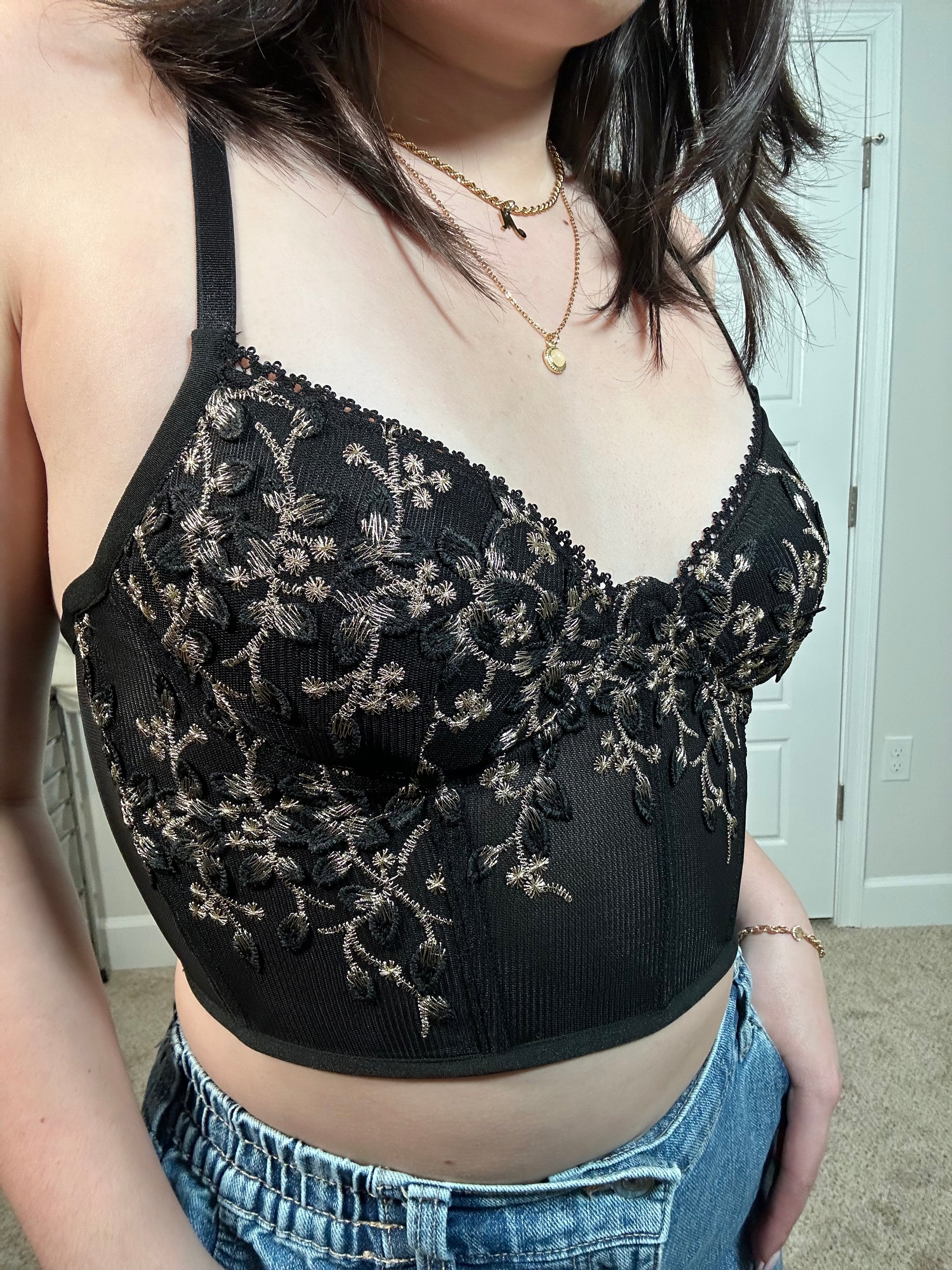 Black spaghetti strap cropped corset top with gold floral embroidery