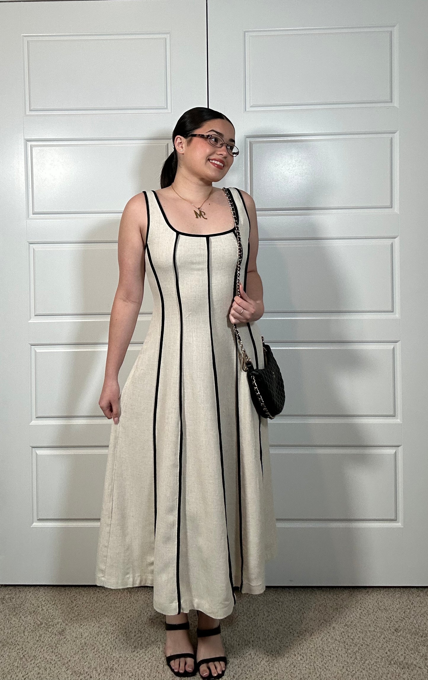 Cream colored linen sleeveless midi dress with black stripes