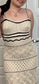 Cream crocheted dress with black stripes and woven details