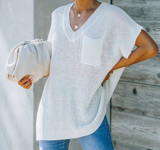 Lightweight white short sleeve sweater with chest pocket and slit detail on the side