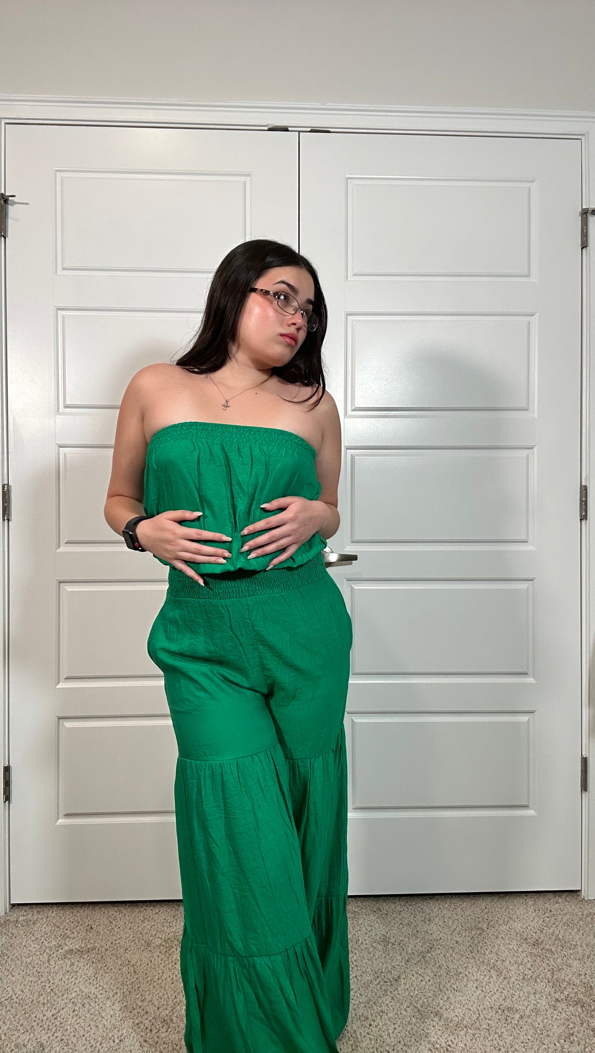 Kelly green strapless jumpsuit with tiered wide legs