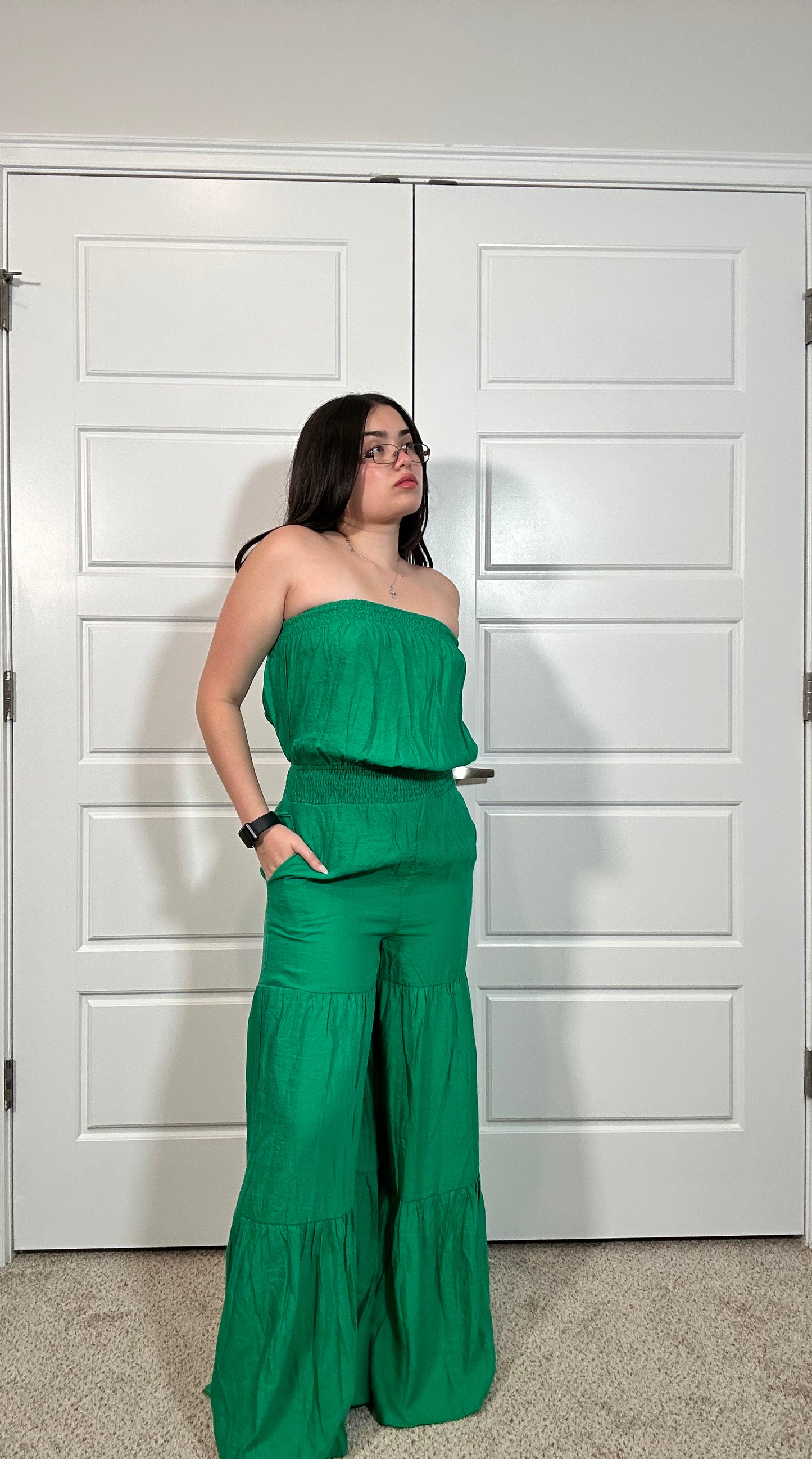 Kelly green strapless jumpsuit with tiered wide legs