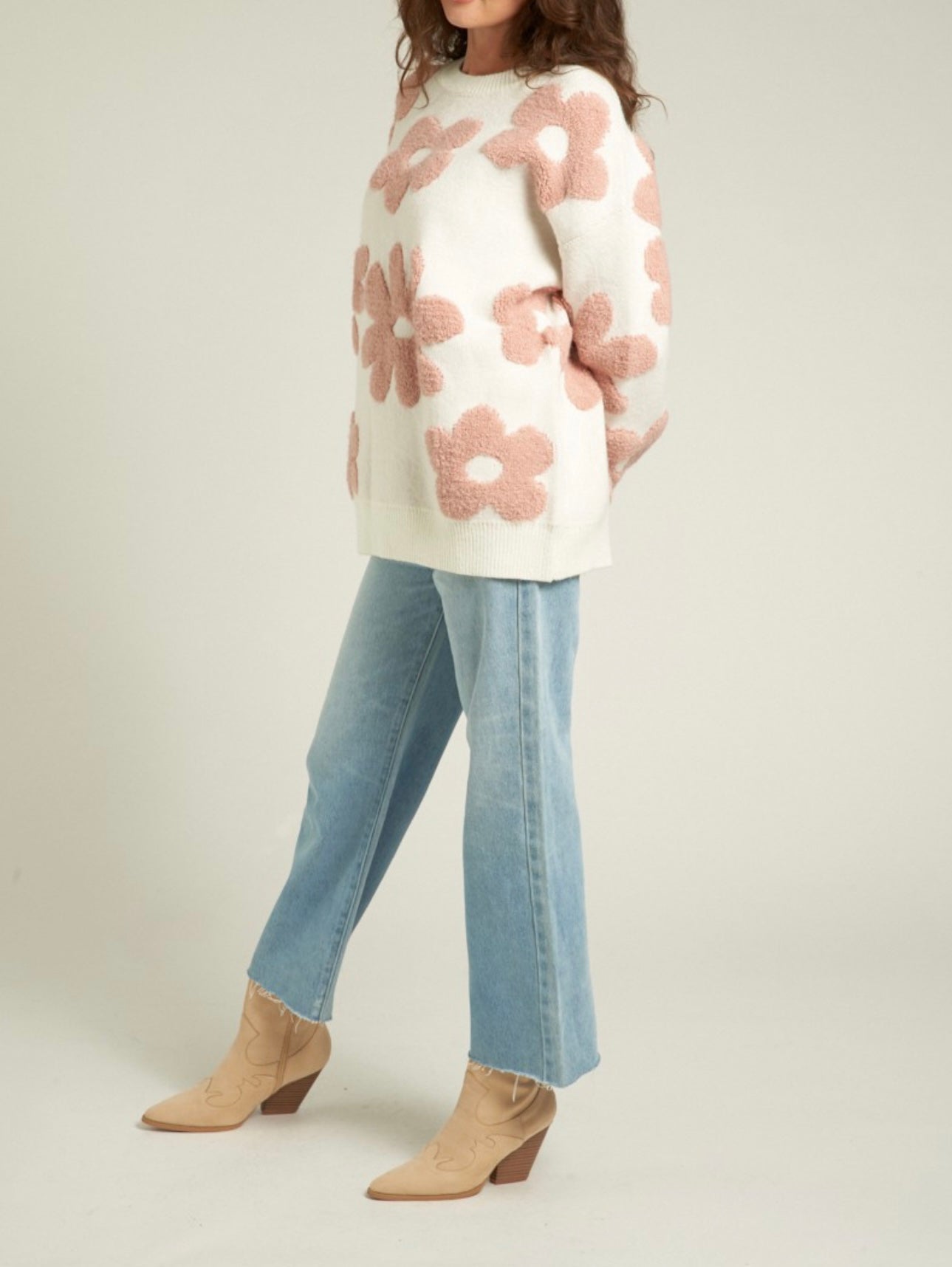 White sweater with large fuzzy mauve pink flowers 