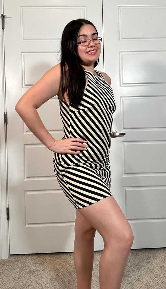 Sleeveless mini dress with black and white diagonal stripes