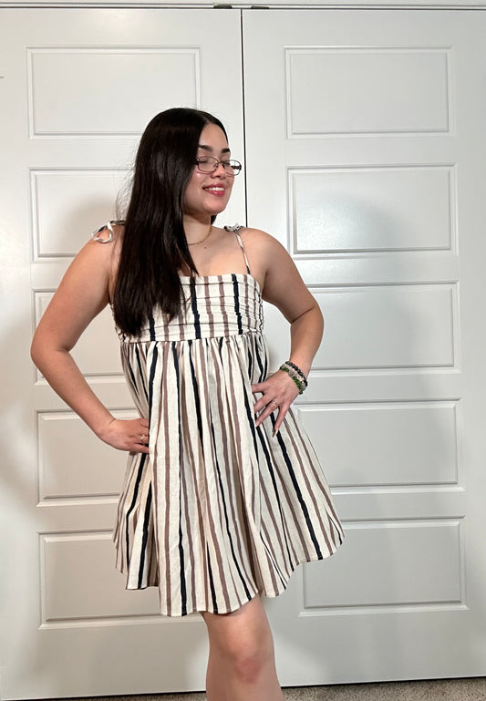 Cream strapless short sundress with black and tan stripes