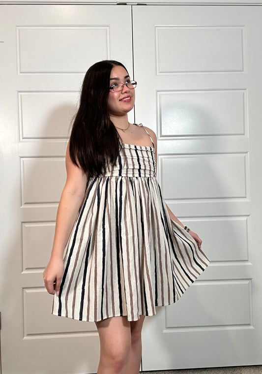 Cream strapless short sundress with black and tan stripes