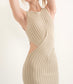 Tan sleeveless knit ankle length dress with ribbed detail and cut outs at waist